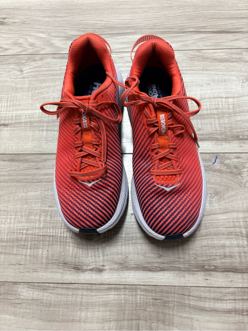 Hoka One One Rincon Athletic Running Shoes in Bright Orange and Black